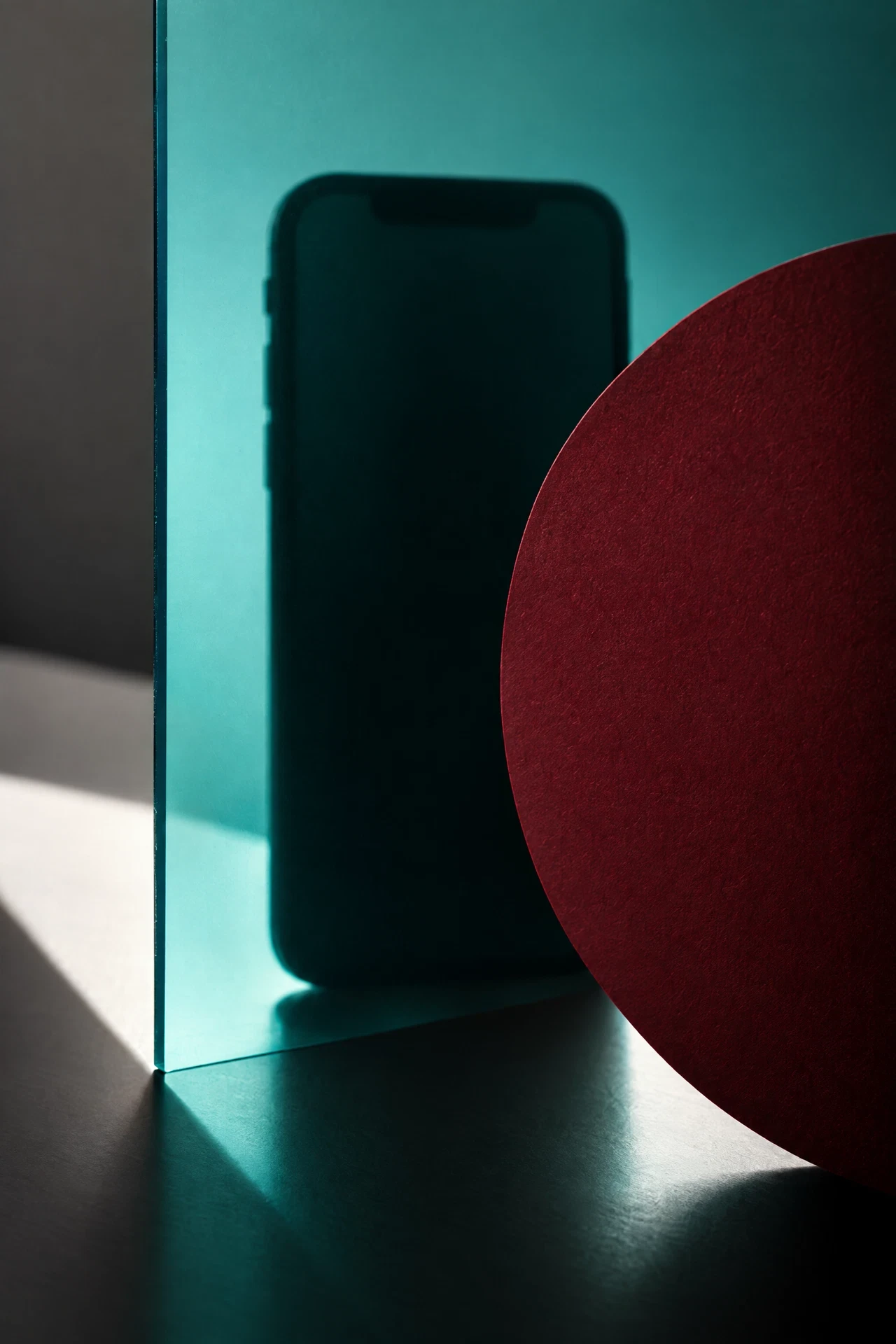 Generic phone silhouette behind translucent teal panel
